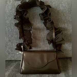 Elegant Black Bag with Ruffle Handle